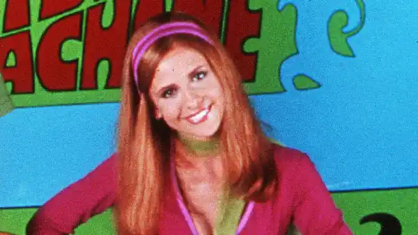 Sarah Michelle Gellar Reveals a 'Steamy' Kiss Between Daphne and Velma Was Cut From 'Scooby-Doo' Movie: 'The World Wants to See It' purple dress