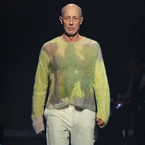 ‘The White Lotus’ Star Jon Gries Makes Surprise Runway Appearance at New York Fashion Week green sweater