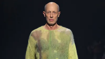 ‘The White Lotus’ Star Jon Gries Makes Surprise Runway Appearance at New York Fashion Week green sweater