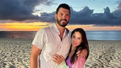 Andi Dorfman on When She Knew Blaine Hart Was The One — and Whether They Are Competitive on Race Day pink and green dress