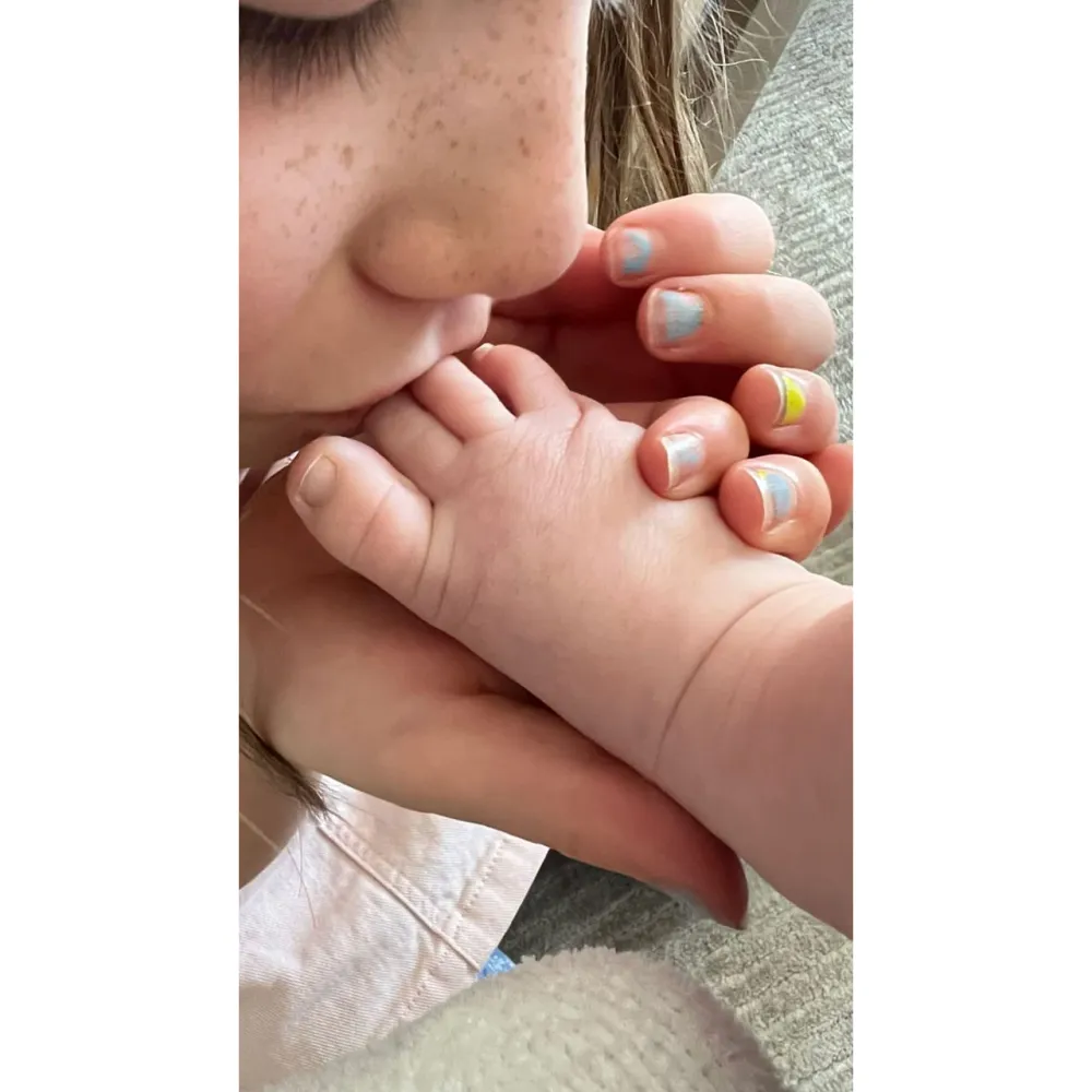 Behati Prinsloo Offers Glimpse at Her and Adam Levine Daughter Bonding With Newborn Baby 2