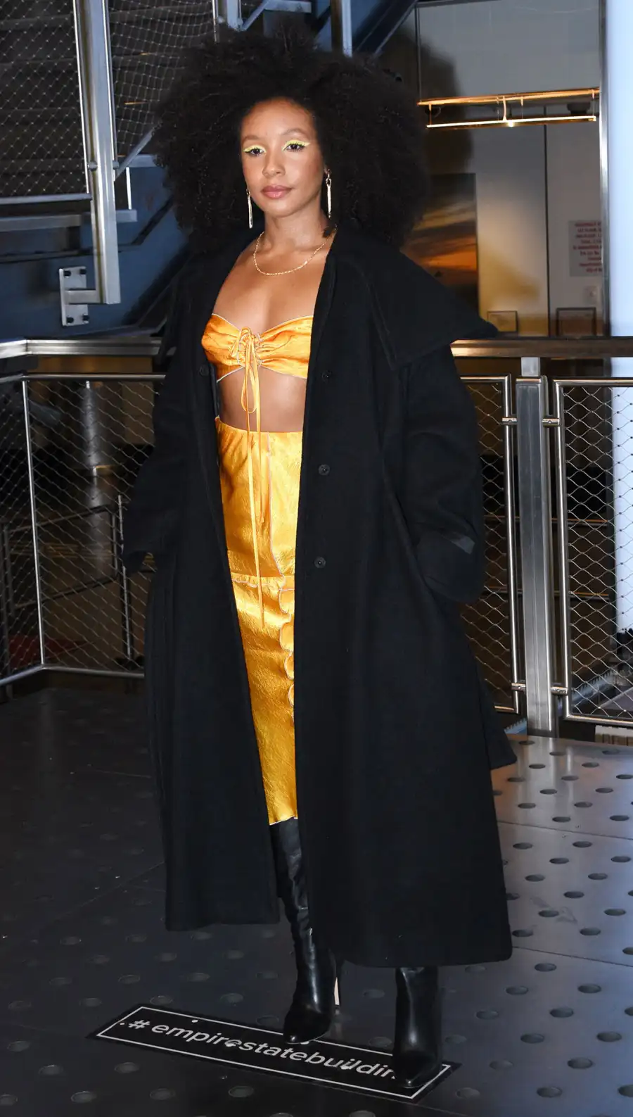 Best Daisy Jones & The Six Press Tour Looks black coat