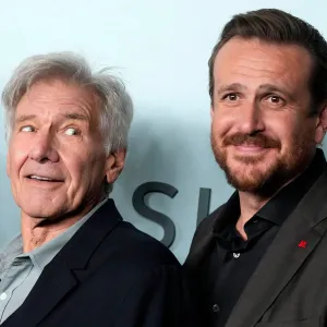 Harrison Ford Drove Golf Cart in Pink Jumpsuit to Surprise Jason Sege