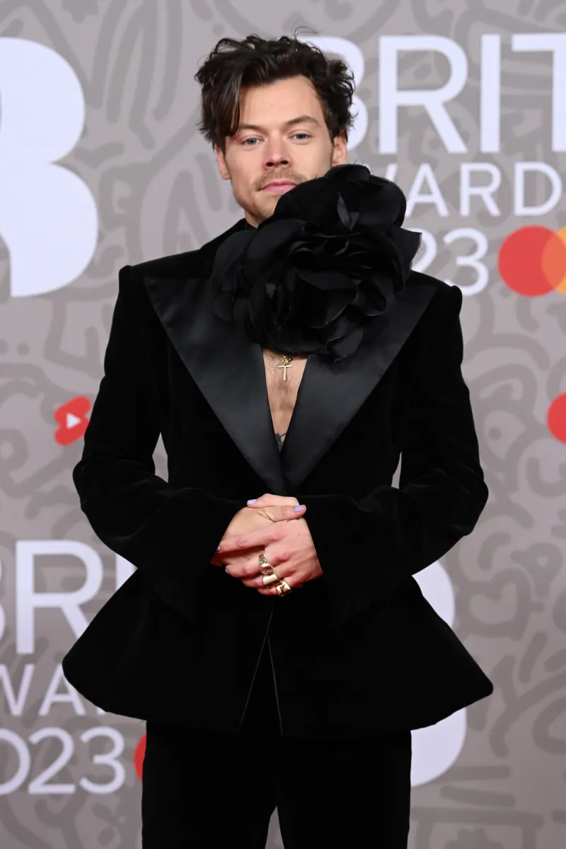 Harry Styles Wears One Direction Shirt