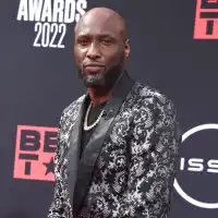 Khloe Kardashian Recalls Feeling ‘Obsessive’ About Her Weight After Lamar Odom Divorce: 'The Scale Fs With You' silver and black suit