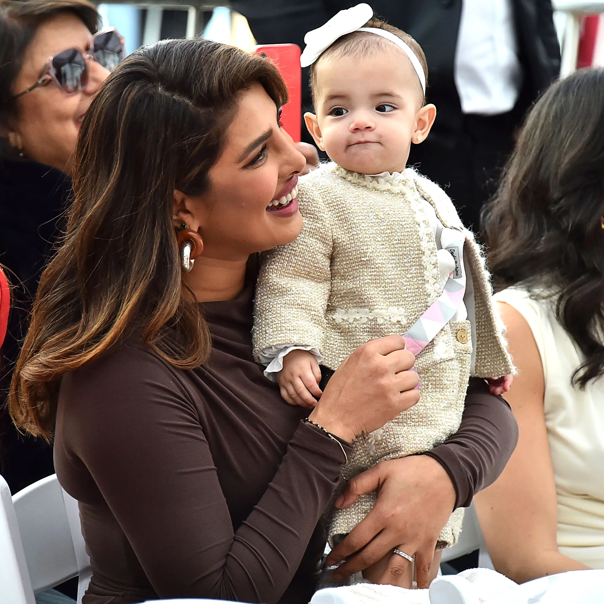 Priyanka Chopra Jonas Relies on 'Community' in Raising 'Greatest Gift' Malti: 'It Takes a Village'