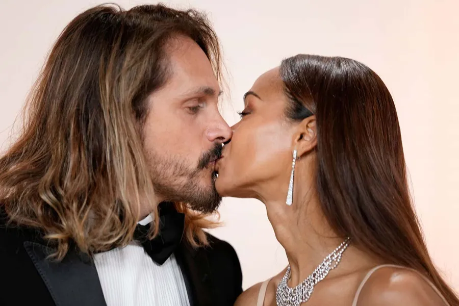 Zoe Saldana, Marco Perego Saldana Share a Sweet Kiss on Oscars Carpet March 2023