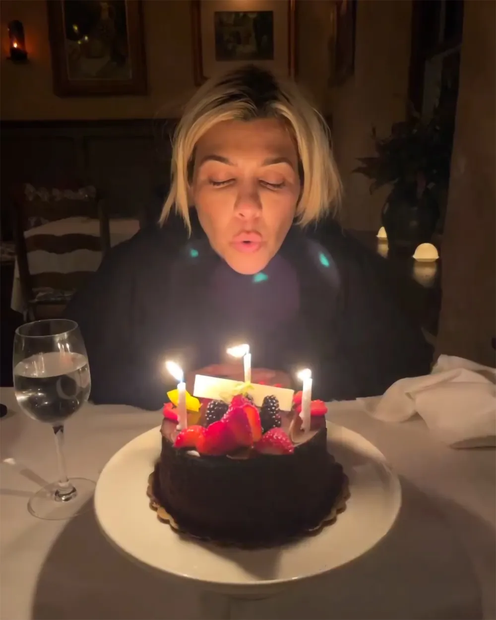 Kourtney Kardashian Claps Back at Fan Criticizing Lavish Display of Birthday Flowers