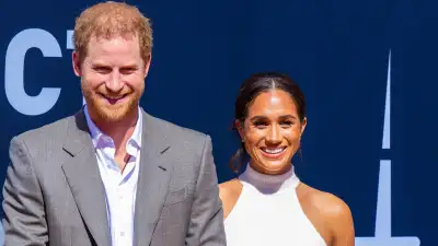 Prince Harry and Meghan Markle Cozy Up for the Kiss Cam at Los Angeles Lakers Game