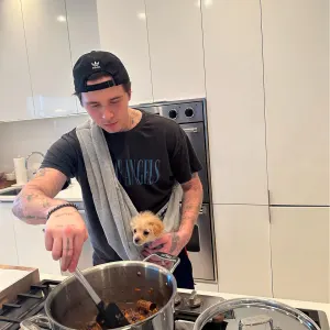 Brooklyn Beckham Claps Back at Criticism for Cooking Pasta Sauce With a Wine Cork in the Pot: It Makes a 'Tender Dish'