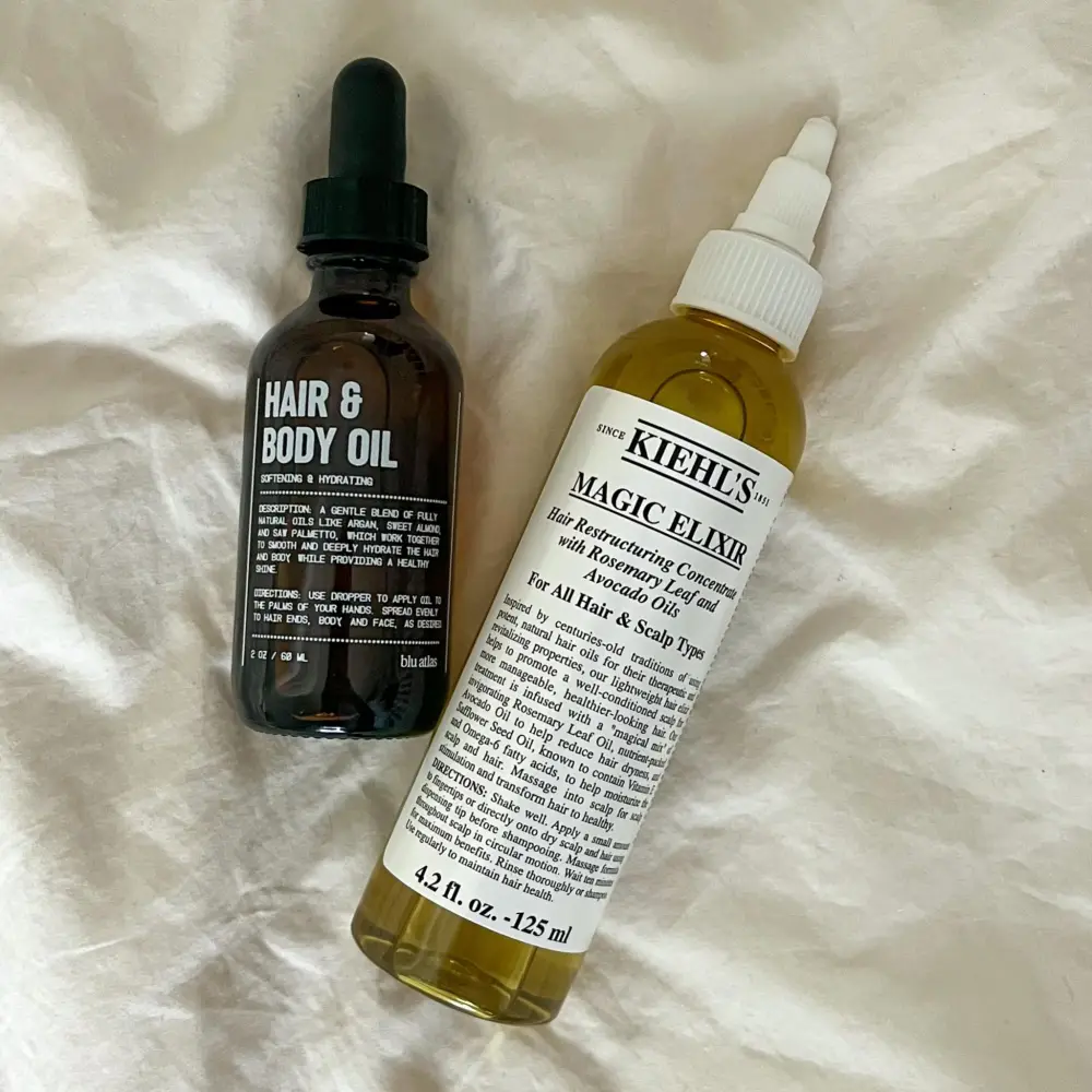 Blu Atlas Hair & Body Oil (left), Kiehl&rsquo;s Magic Elixir (right)