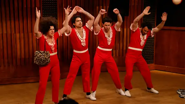 Jonas Brothers Learn Choreography From Molly Shannon on ‘Saturday Night Live’ — In Matching Unitards