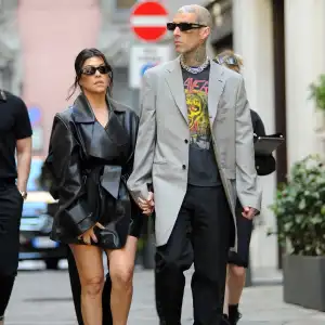 Travis Barker and Kourtney Kardashian Break Down Behind-the-Scenes Details From Their Italian Nuptials: Helicopter Drops, Wedding Day Boat Jumps and More