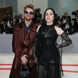 Billie Eilish Stuns at the 2023 Met Gala Red Carpet in a Sheer Black Gown- Photos