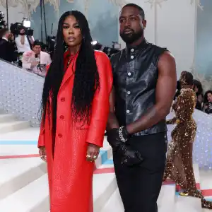 Feature Gabrielle Union Captivates in Crimson at 2023 Met Gala Poses With Husband Dwyane Wade