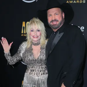 Garth Brooks Calls Dolly Parton the ‘GOAT' in 2023 ACM Awards Opening —— She Claims It Stands for ‘Garth Organize A Threesome’ 724 Dolly Parton and Garth Brooks