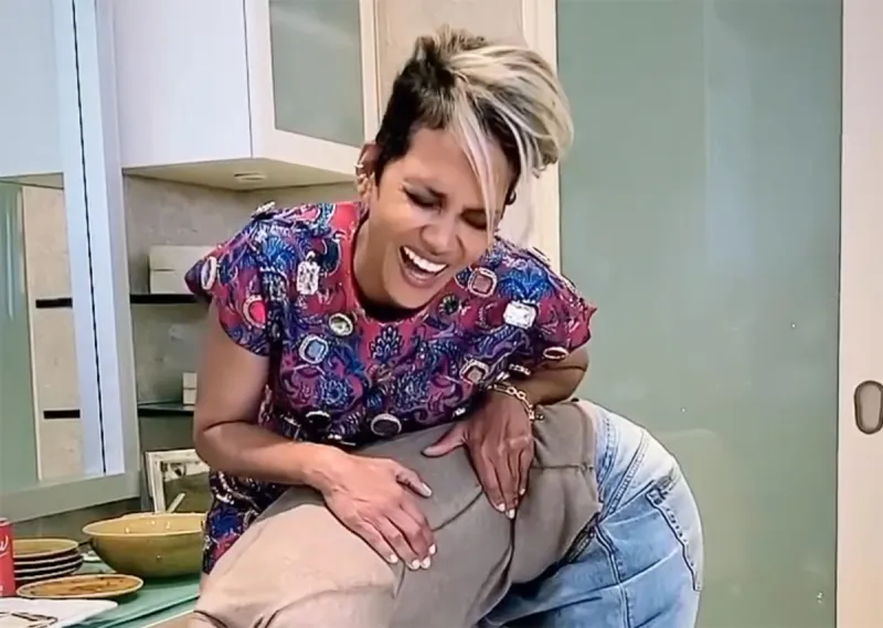 LOL! Halle Berry Struggles to Fit into Boots That Were ‘Made For Her promo