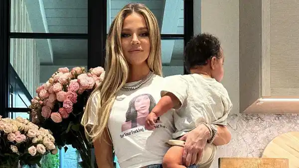 Khloe Kardashian Wears Kim Kardashian Meme Shirt While Holding Son