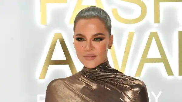 Khloe Kardashian Wears Kim Kardashian Meme Shirt While Holding Son