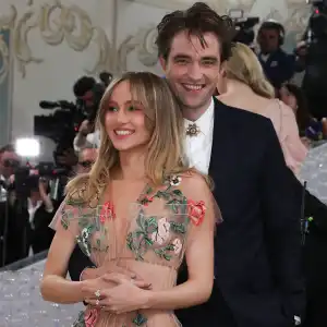Suki Waterhouse and Robert Pattinson Cuddle Up Give Rare Look at Romance on 2023 Met Gala Red Carpet Photos