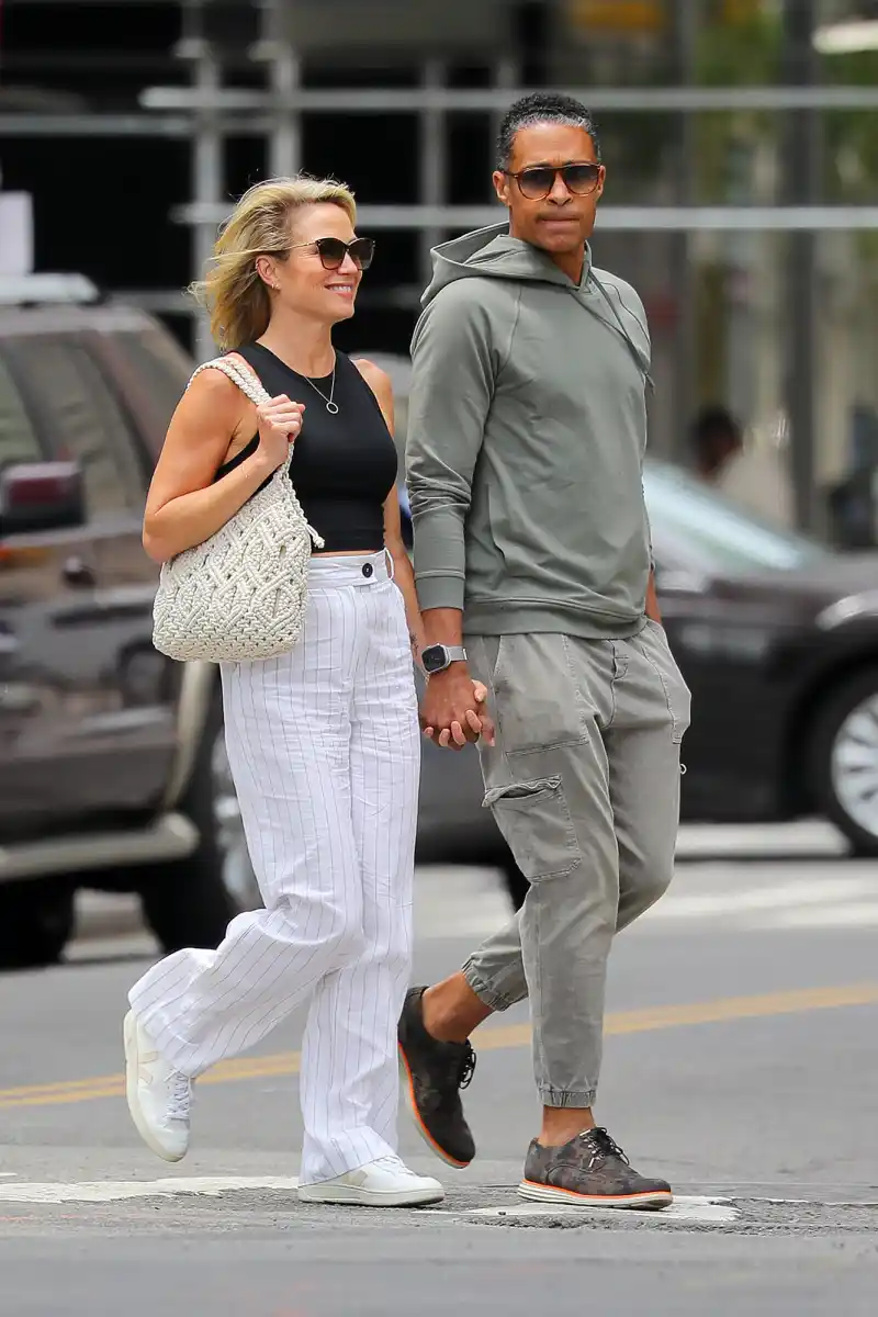 Amy Robach and TJ Holmes Hold Hands After Elisabeth Shue Says Andrew Shue Is Doing 'Great' After Scandal