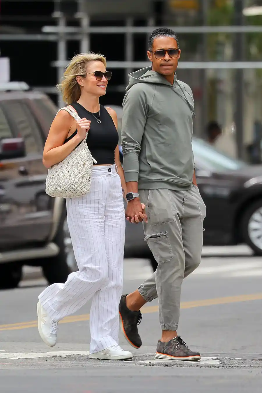 Amy Robach and TJ Holmes Hold Hands After Elisabeth Shue Says Andrew Shue Is Doing 'Great' After Scandal