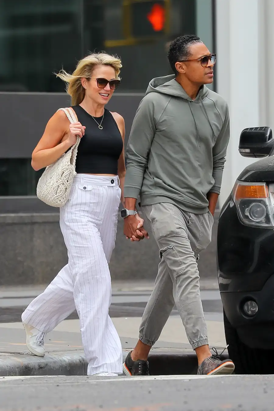 Amy Robach and TJ Holmes Hold Hands After Elisabeth Shue Says Andrew Shue Is Doing 'Great' After Scandal