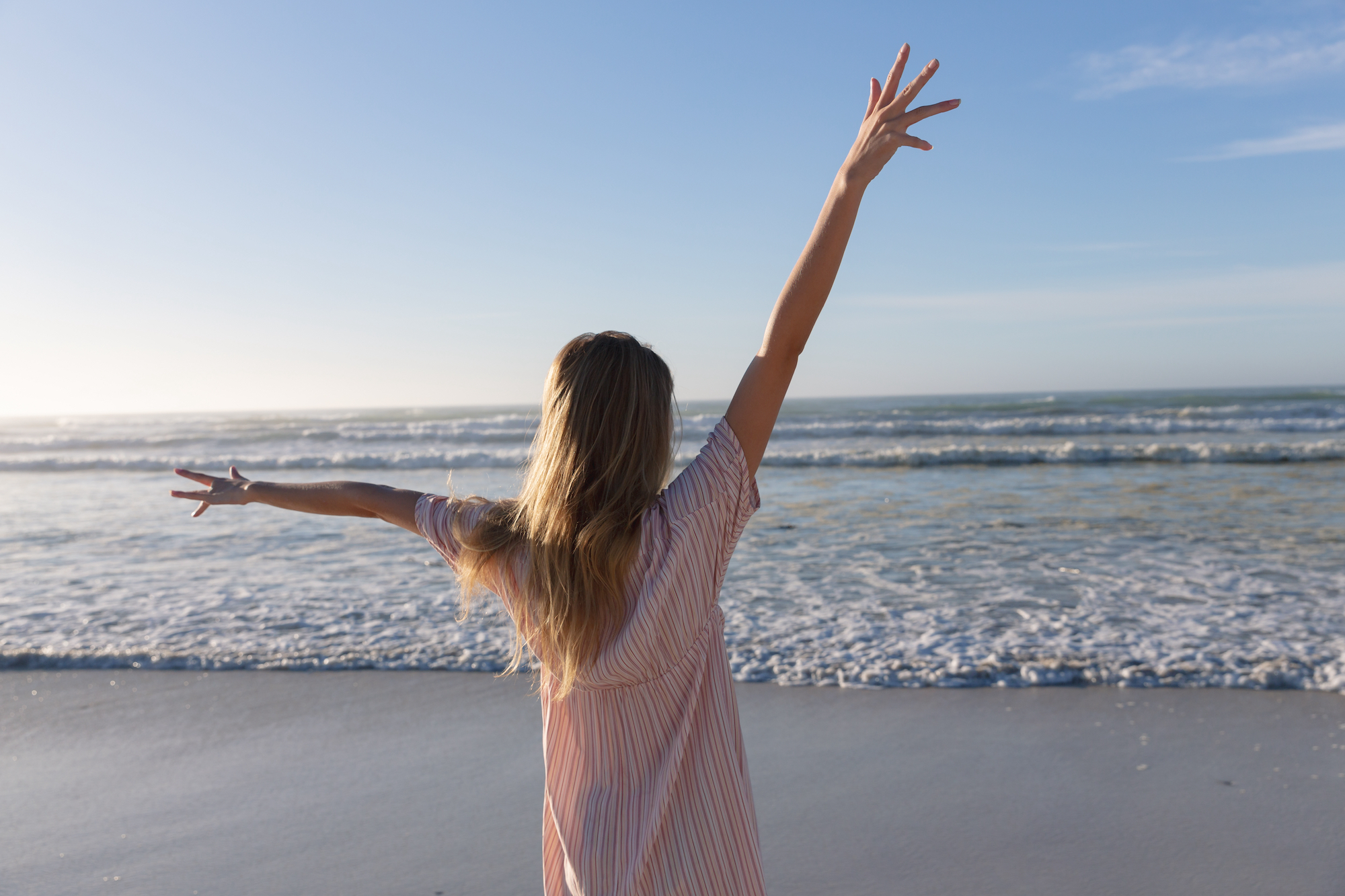 Woman-At-The-Beach-Stock-Photo