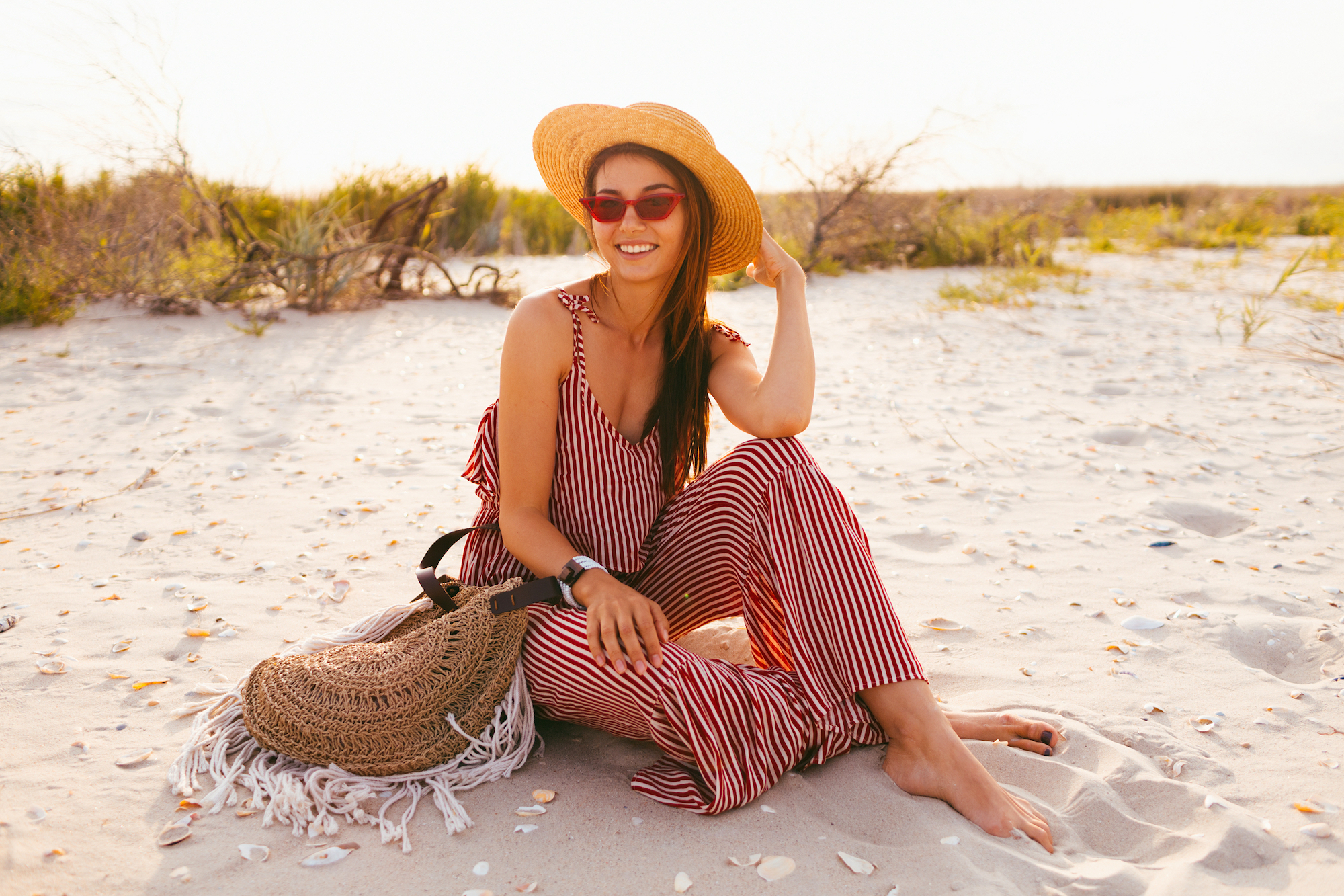Woman-Wearing-Romper-At-Beach-Stock-Photo