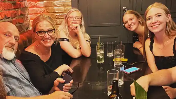 Christine Brown Travels to London With Fiancee David Woolley, Daughters