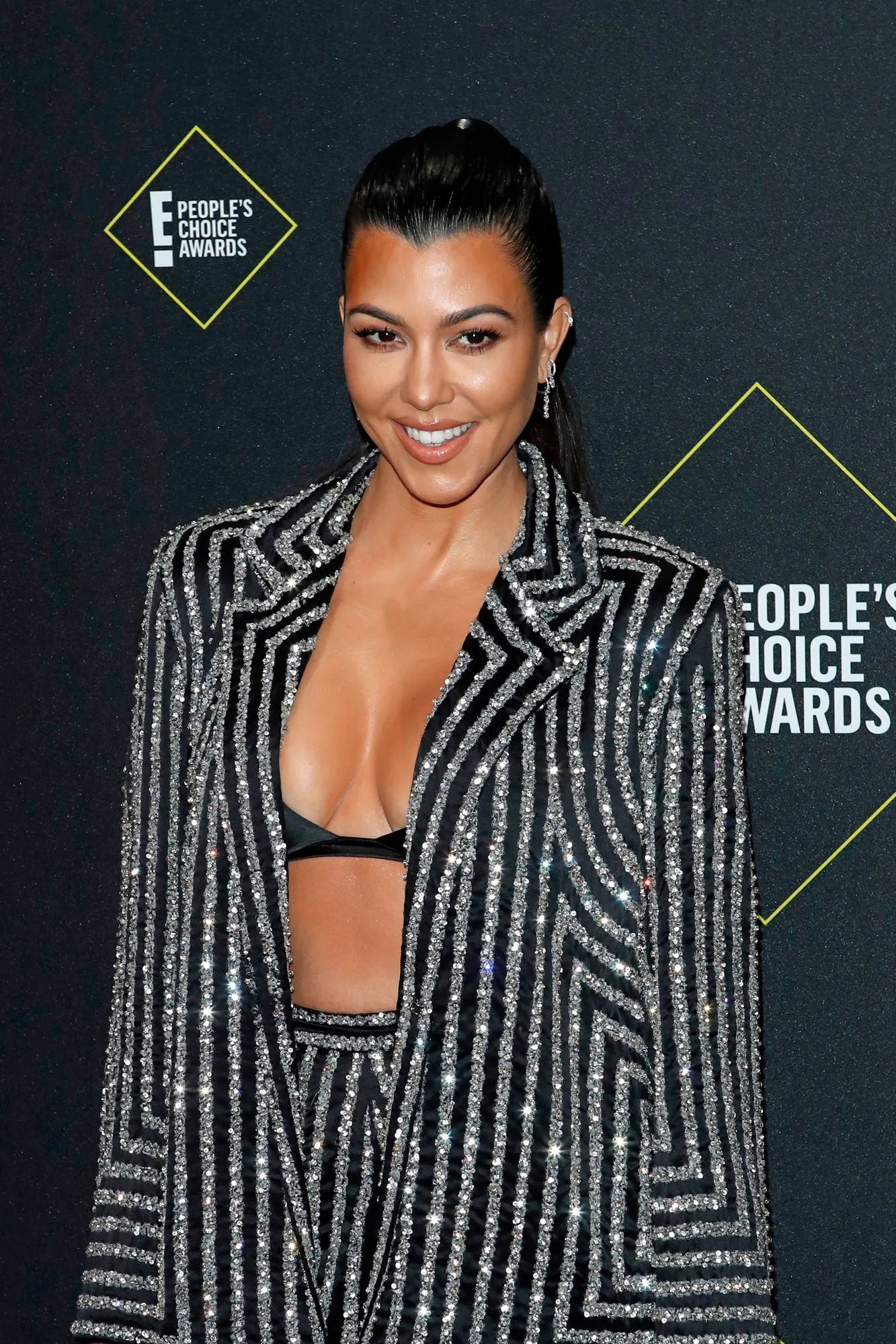 Kourtney K Wears Unbottoned Pink Jorts to See Barbie