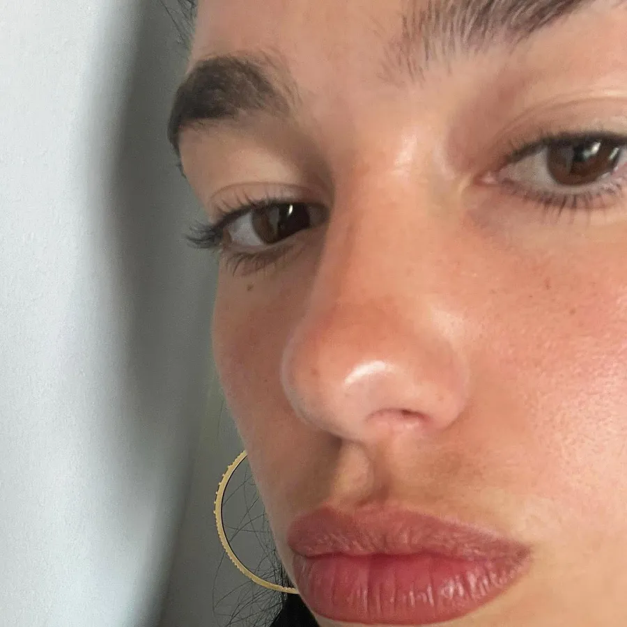 The Most Breathtaking Celeb Makeup-Free Moments of 2023 Anne Hathaway Kim Kardashian and More 437 Dua Lipa