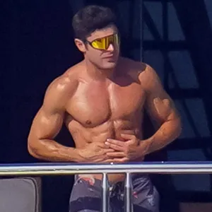 Zac Efron Shows Off Toned Muscles During Rare Public Appearance on Luxury Yacht