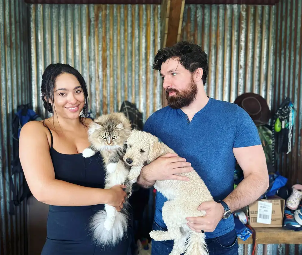 Love Is Blind's Zack Goytowski and Bliss Poureetezadi Bring Dog and Cat Back Replica Luxury Handbag