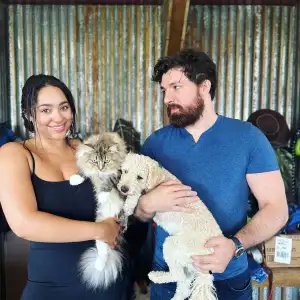 Love Is Blind's Zack Goytowski and Bliss Poureetezadi Bring Dog and Cat Back Replica Luxury Handbag