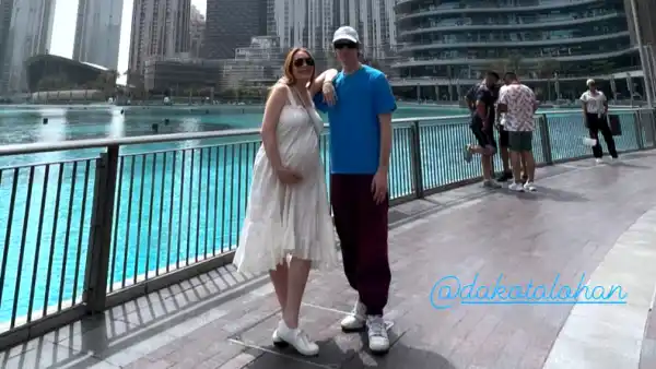 Pregnant Lindsay Lohan Cradles Baby Bump While Hanging With Brother Dakota