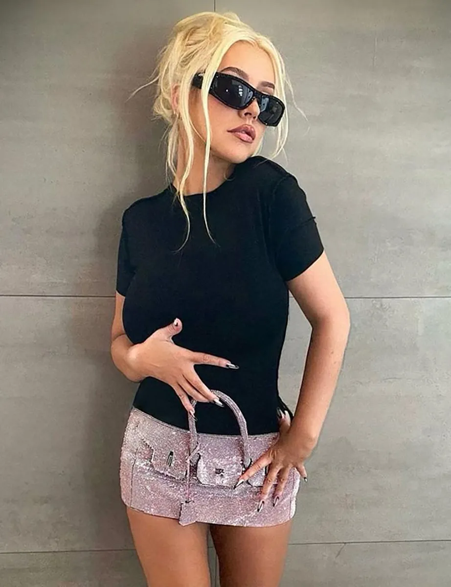Christina Aguilera Wears Purse Skirt
