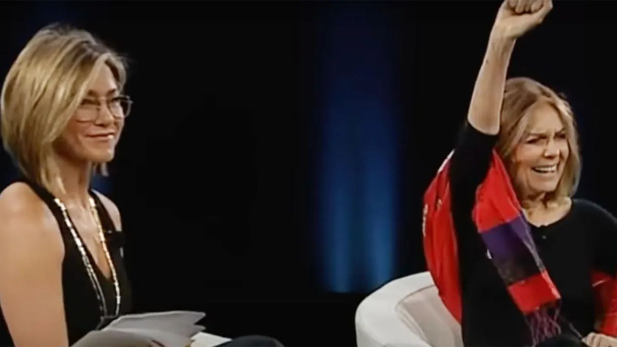 Jennifer Aniston Wears “T” Necklace, Engagement Ring While Interviewing Gloria Steinem at Makers Conference