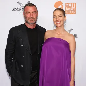 Liev Schreiber in Black Suit and Pregnant Taylor Neisen in Purple Dress Smile and Pose on Red Carpet for Ali Forney Center A Place At The Table Gala