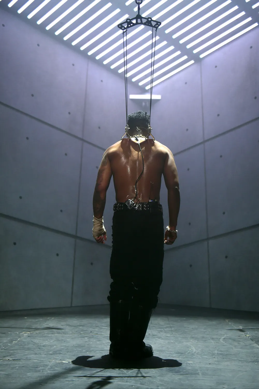 Singer Miguel Got His Back Pierced to Be Suspended By Hooks During Performance: Photos