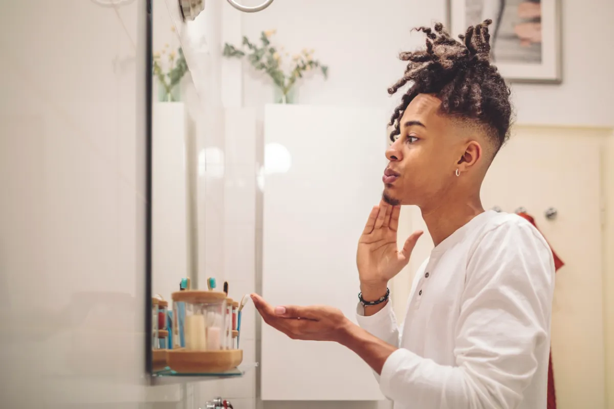 Applying skin care routine