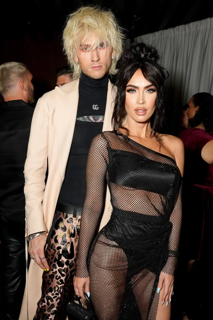 Celeb Couples Who Opened Up About Tackling Long-Distance Dating Prince Harry Meghan Markle and More GettyImages-1442448620 Machine Gun Kelly and Megan Fox
