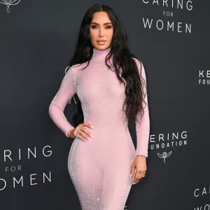 Kim Kardashian Shows Off Abs and Side Boob