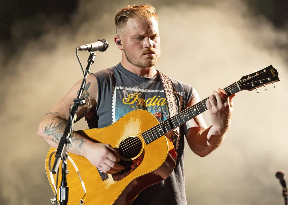 Spotify Features Zach Bryan Mugshot as Outlaw Playlist Cover