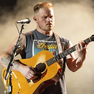 Spotify Features Zach Bryan Mugshot as Outlaw Playlist Cover