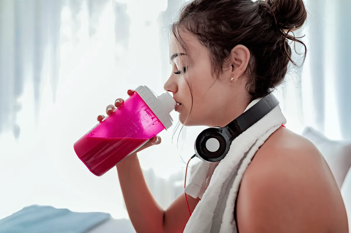 woman drinking best electrolyte powder