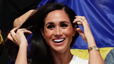 meghan-markle-white-sweater-vest