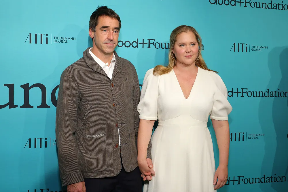 Amy Schumer and Husband Chris Fischer Hold Hands During Red Carpet Date Night 2