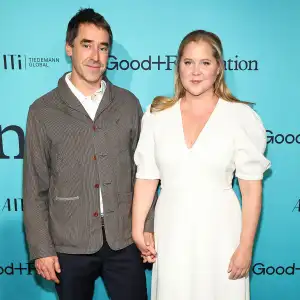 Amy Schumer and Husband Chris Fischer Hold Hands During Red Carpet Date Night
