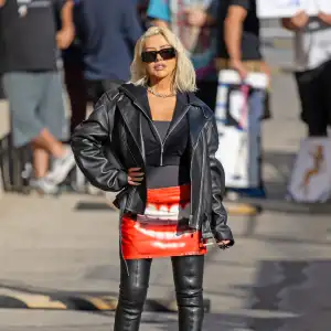 Christina Aguilera Wears a Mouth Print Mini Skirt and Thigh-High Boots to Jimmy Kimmel Show